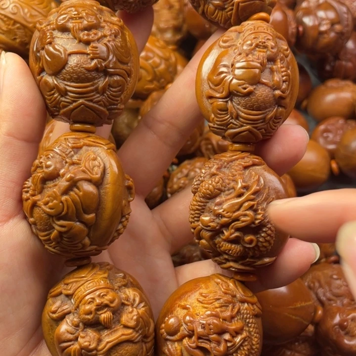 北***客橄榄核吊坠橄榄核手持