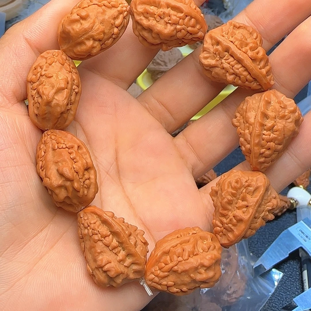 吊坠文玩核桃麒麟角手串