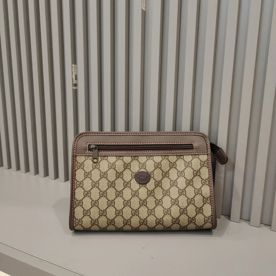 95新 GUCCI/古驰 兔兔奢欣欣/古驰手拿包/241223003