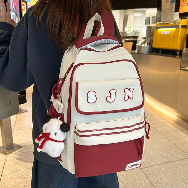 书包女大学生日系撞色初中生潮流双肩包设计感小众户外郊游风背包