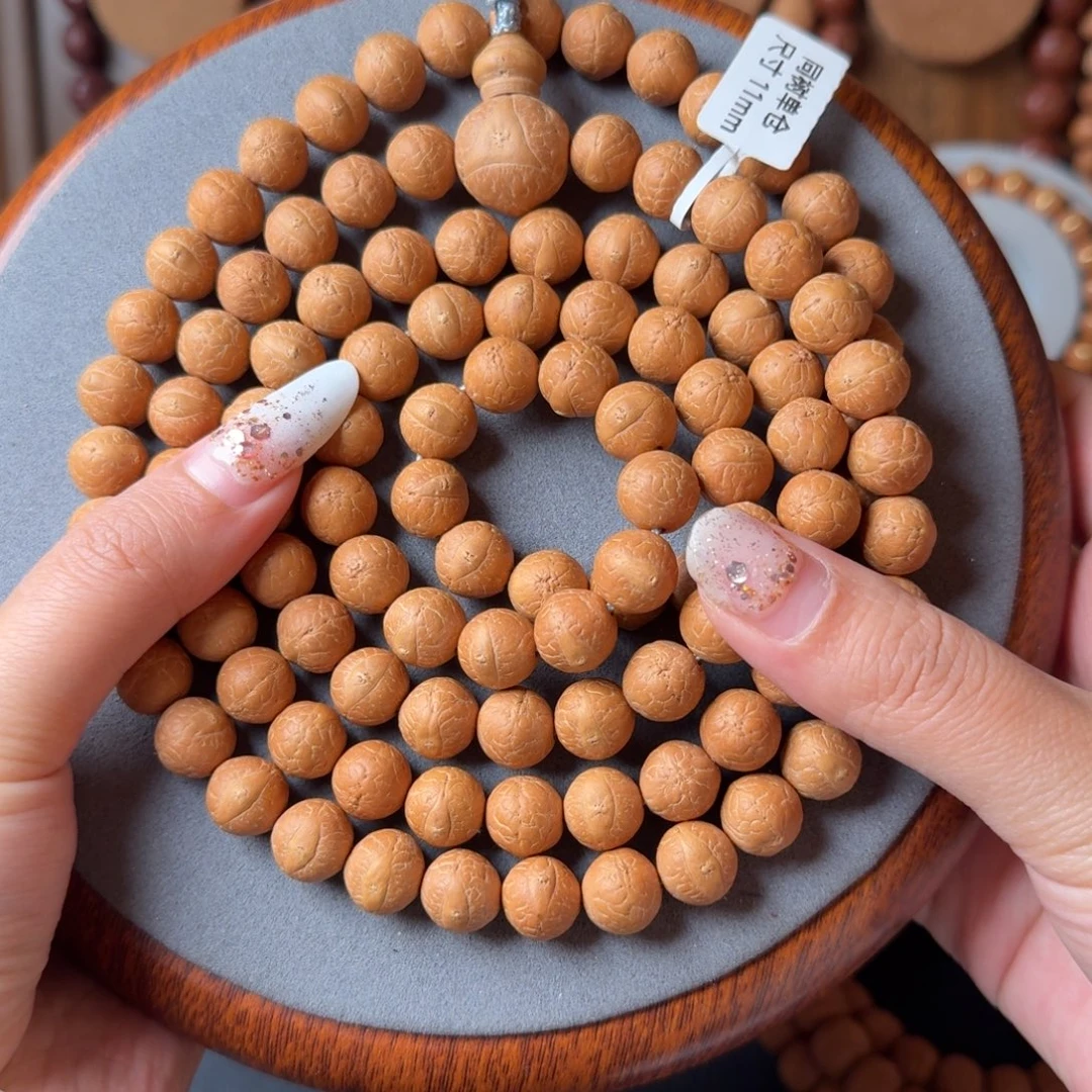 凤眼菩提把件11mm/长串108+6/正圆奶油皮