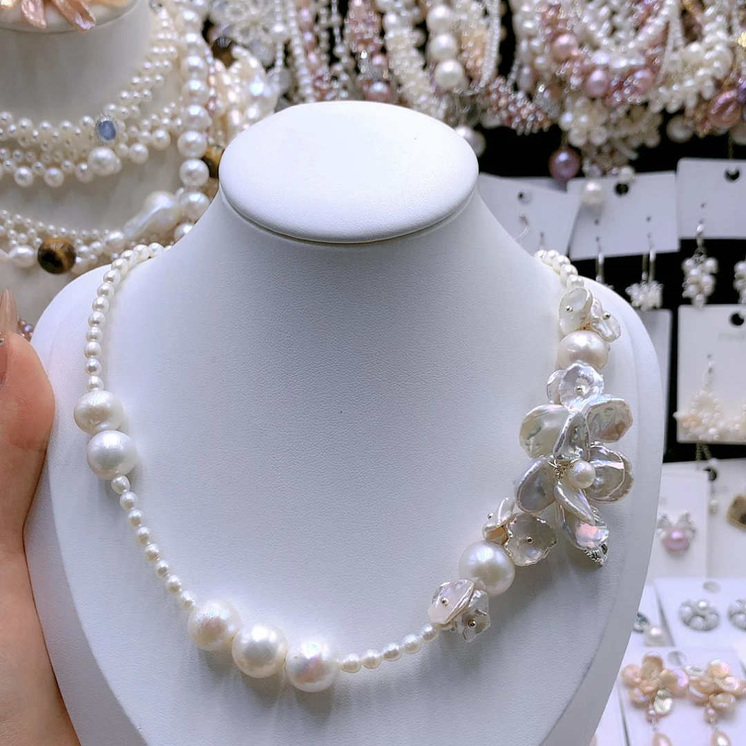 银S925镶嵌耳饰淡水珍珠?****会