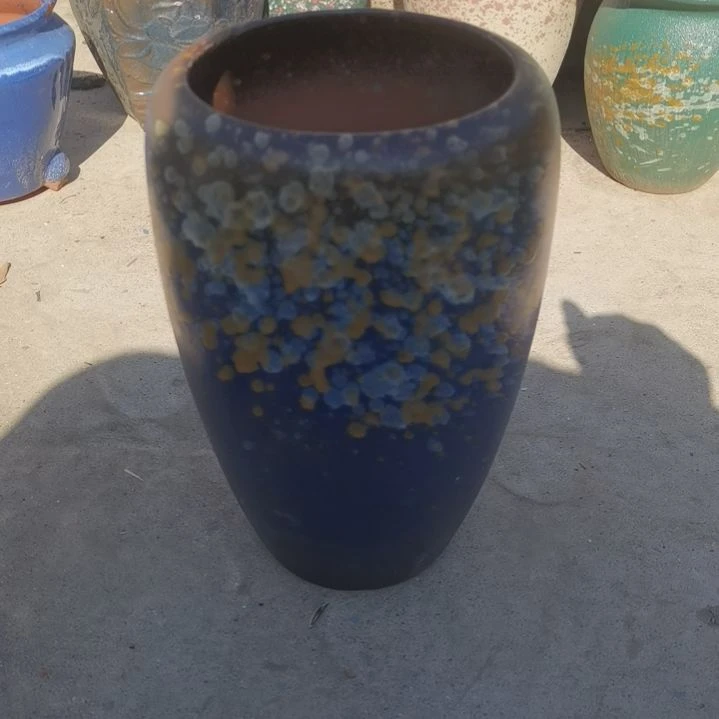 红陶口17高32瑕疵一个