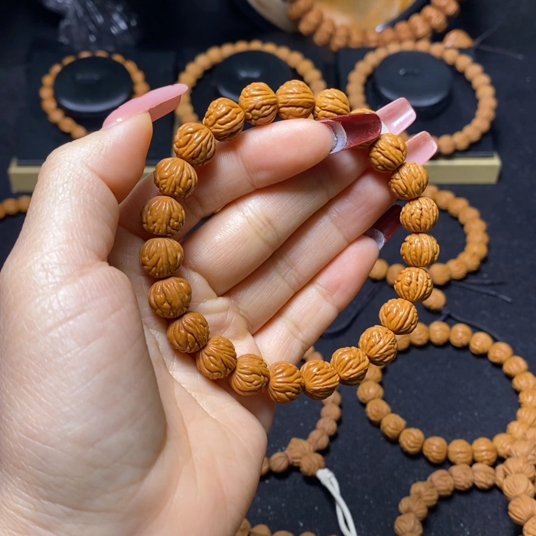 悟***生桃核吊坠秦岭文玩