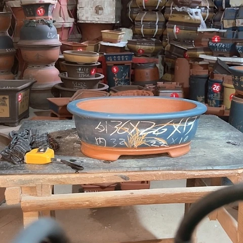 紫砂花盆腰圆盆一个