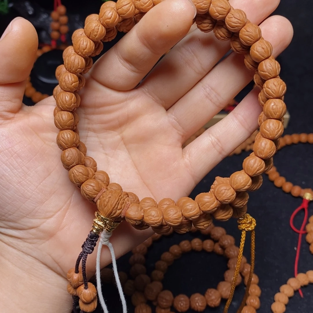 东***红吊坠桃核秦岭文玩