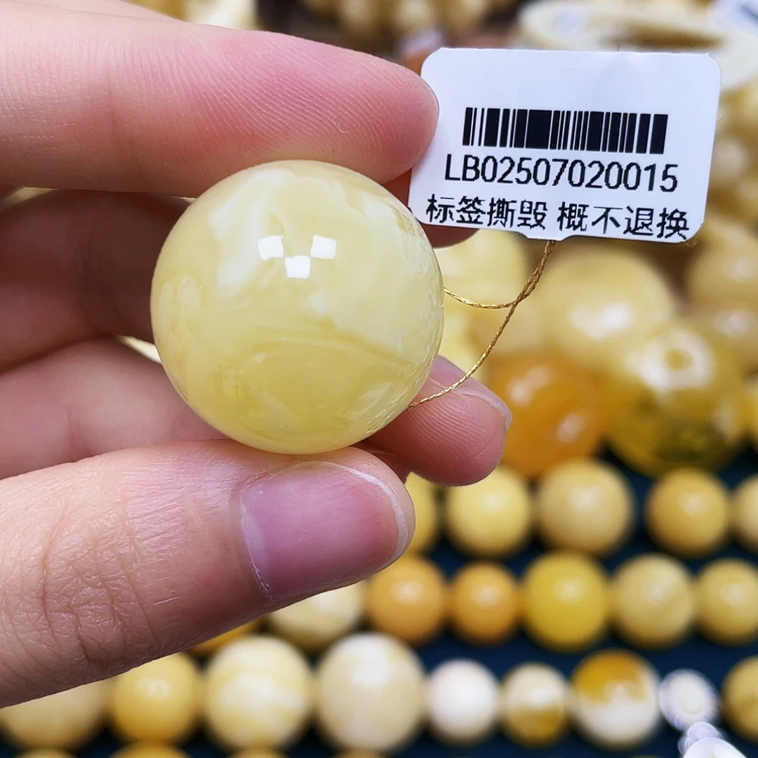琥珀未镶嵌裸石24.1mm.瑕