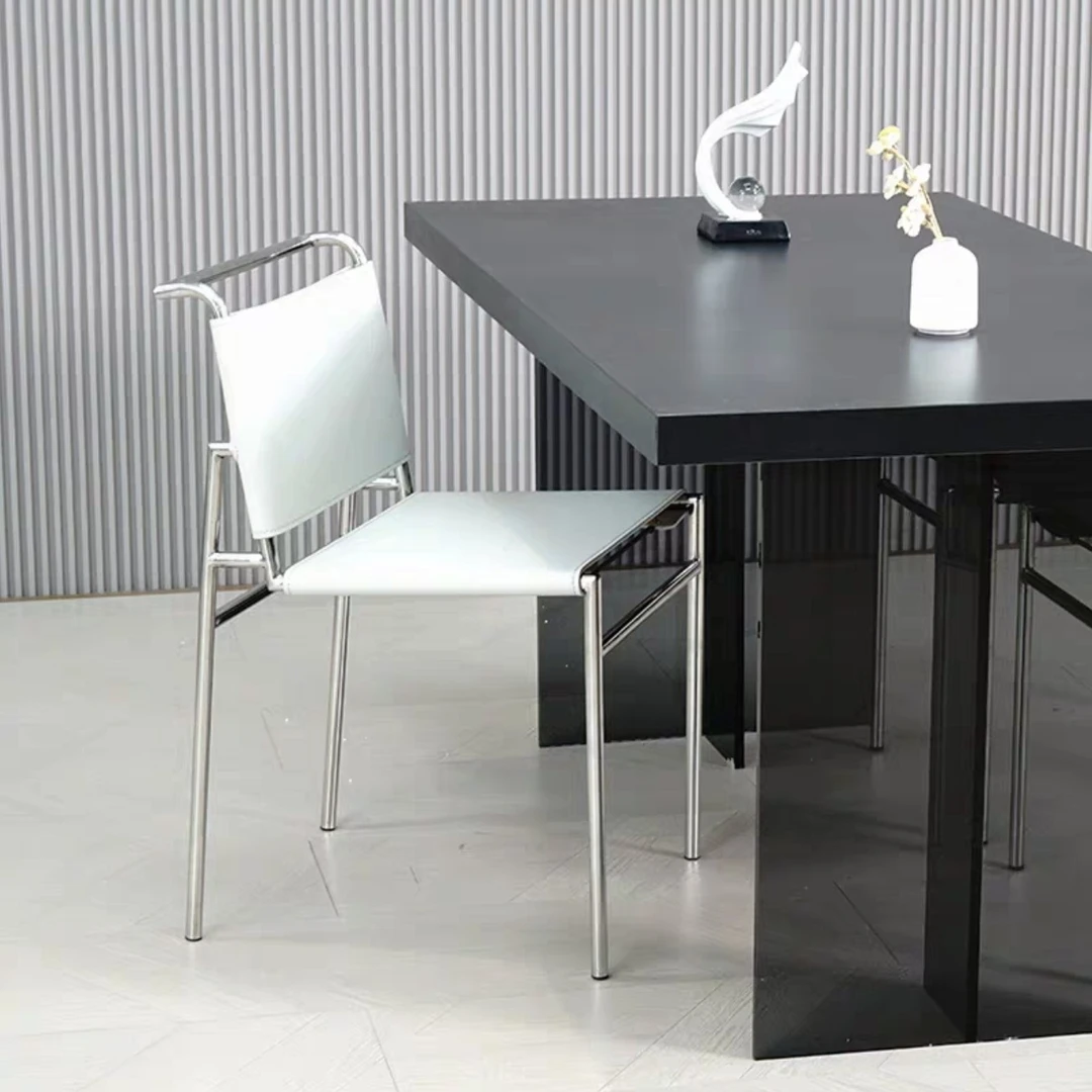 北欧设计师极简轻奢马鞍皮餐椅