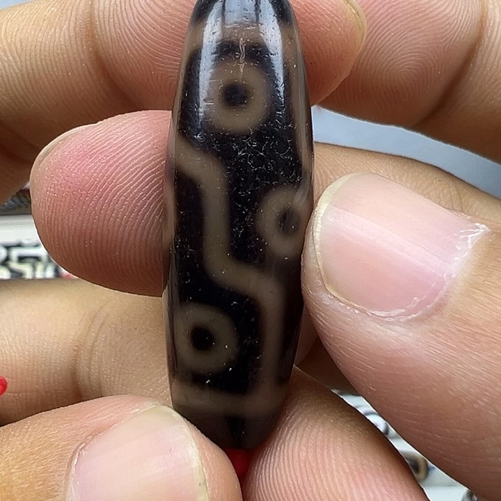 伍***正玛瑙/玉髓未镶嵌吊坠(赠链)曲贡折线九眼天珠