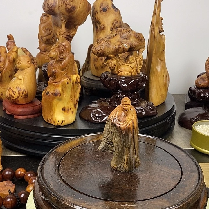 柏木（崖柏）地主手把件
