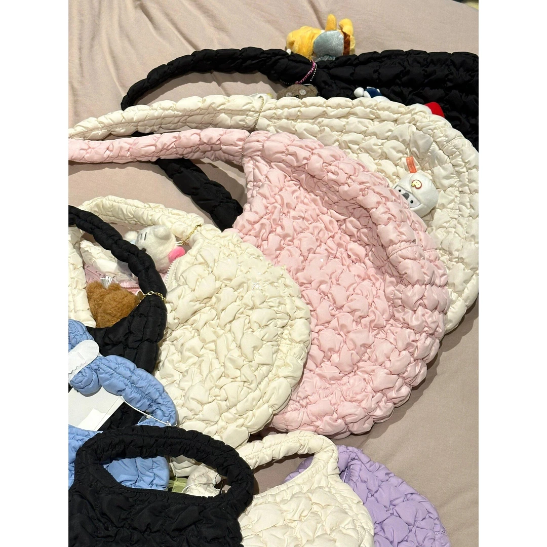 小众奶呼呼云朵褶皱包女2024新款百搭轻质手提单肩包大容量饺子包