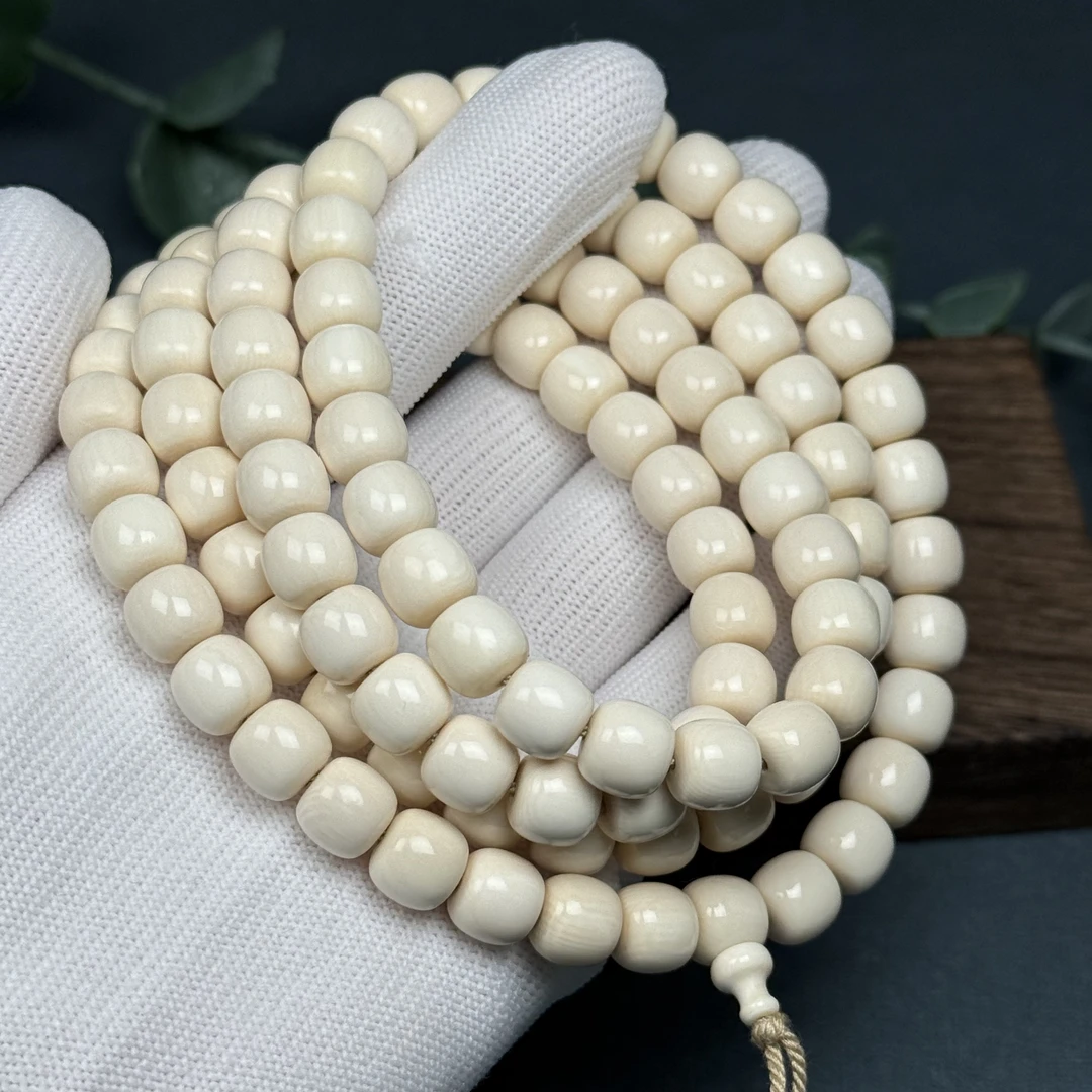 Q35-10天然猛犸牙 老型108 9*8mm支持复检假一罚十