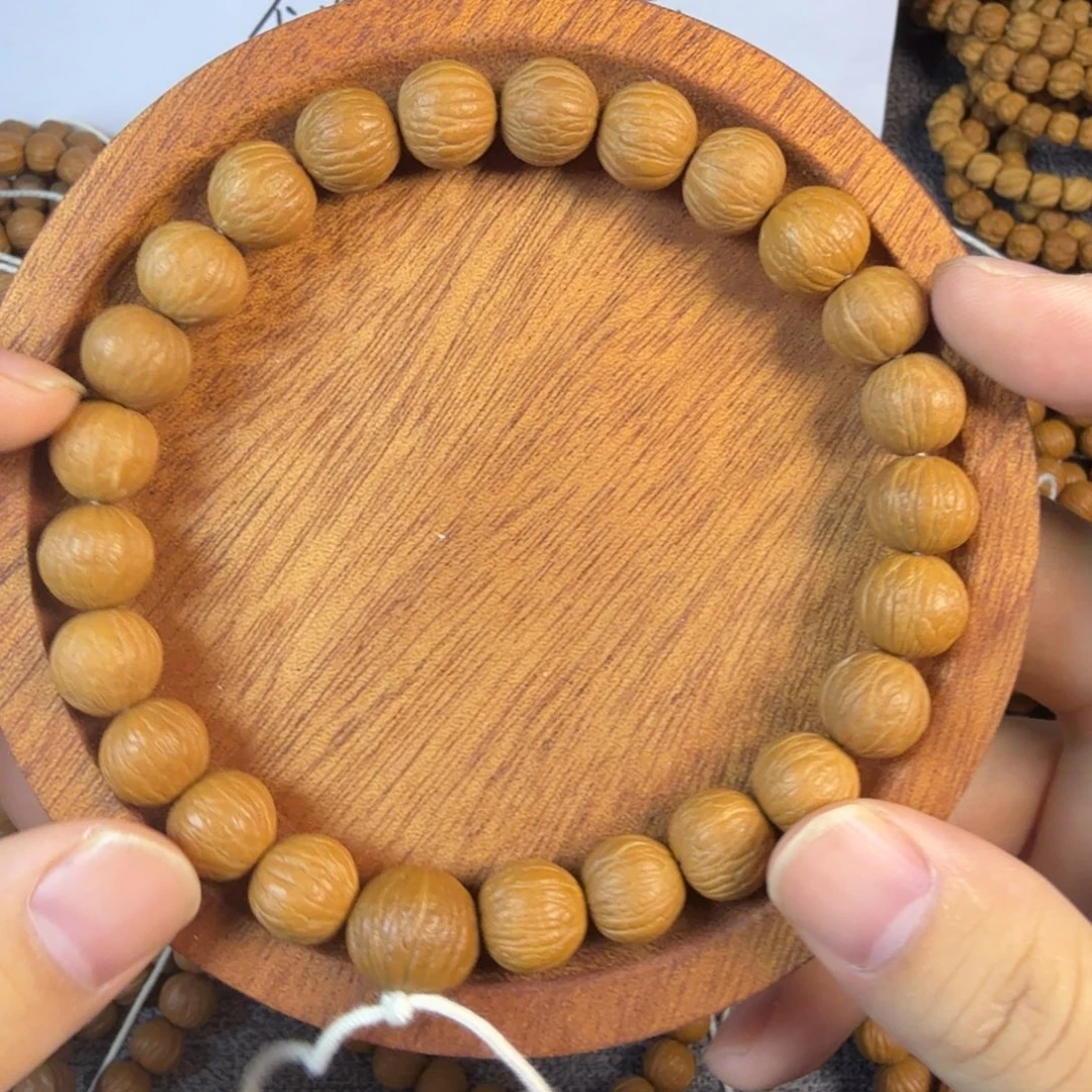 东***伙吊坠猴头核桃原皮凤羽猴头手持