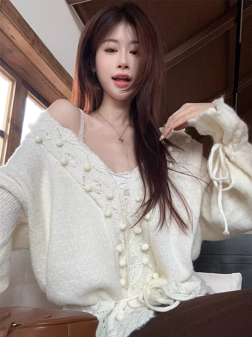慵懒风单排扣镂空长袖针织衫女秋季显瘦V领宽松百搭上衣法式小众