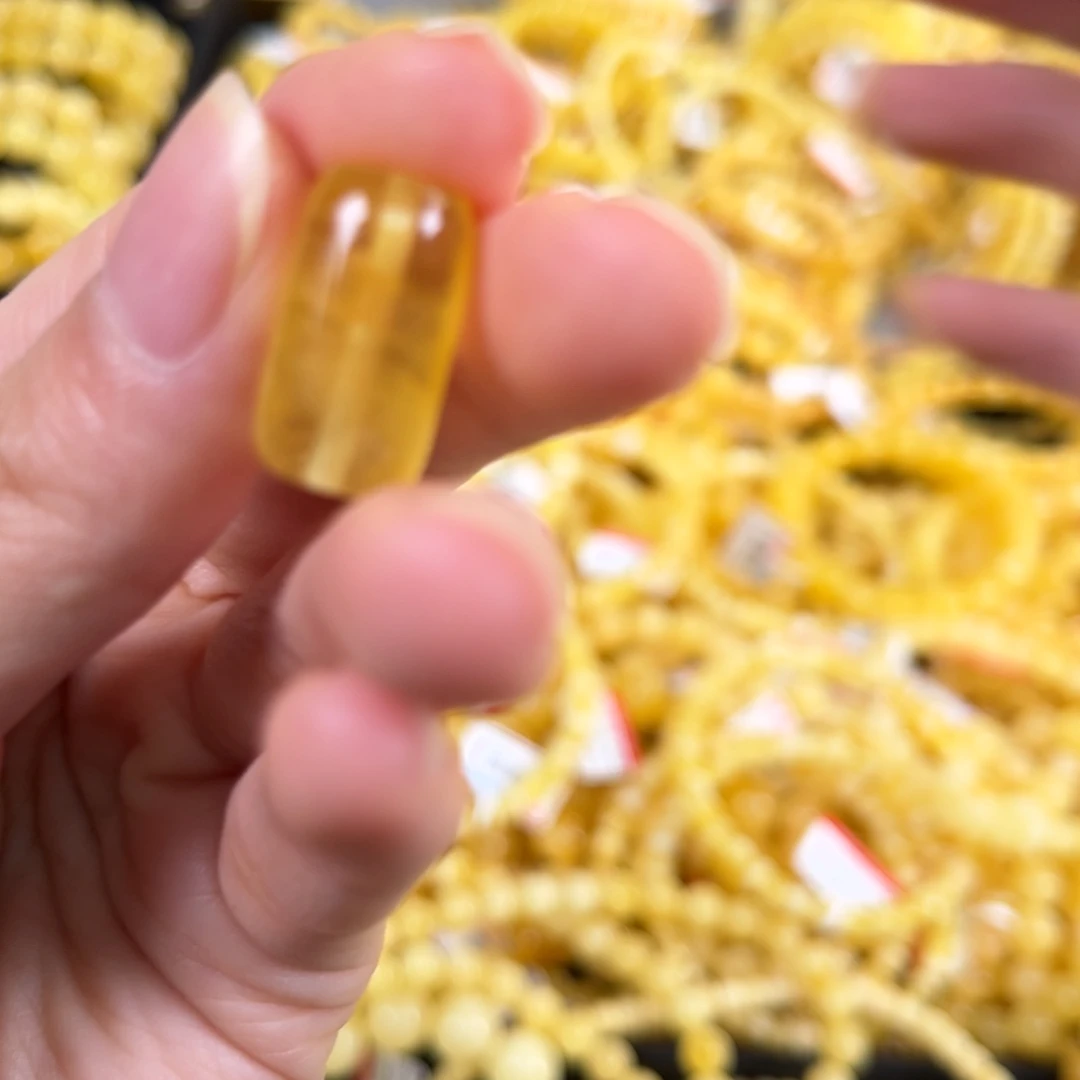 裸石琥珀未镶嵌桶珠金绞蜜