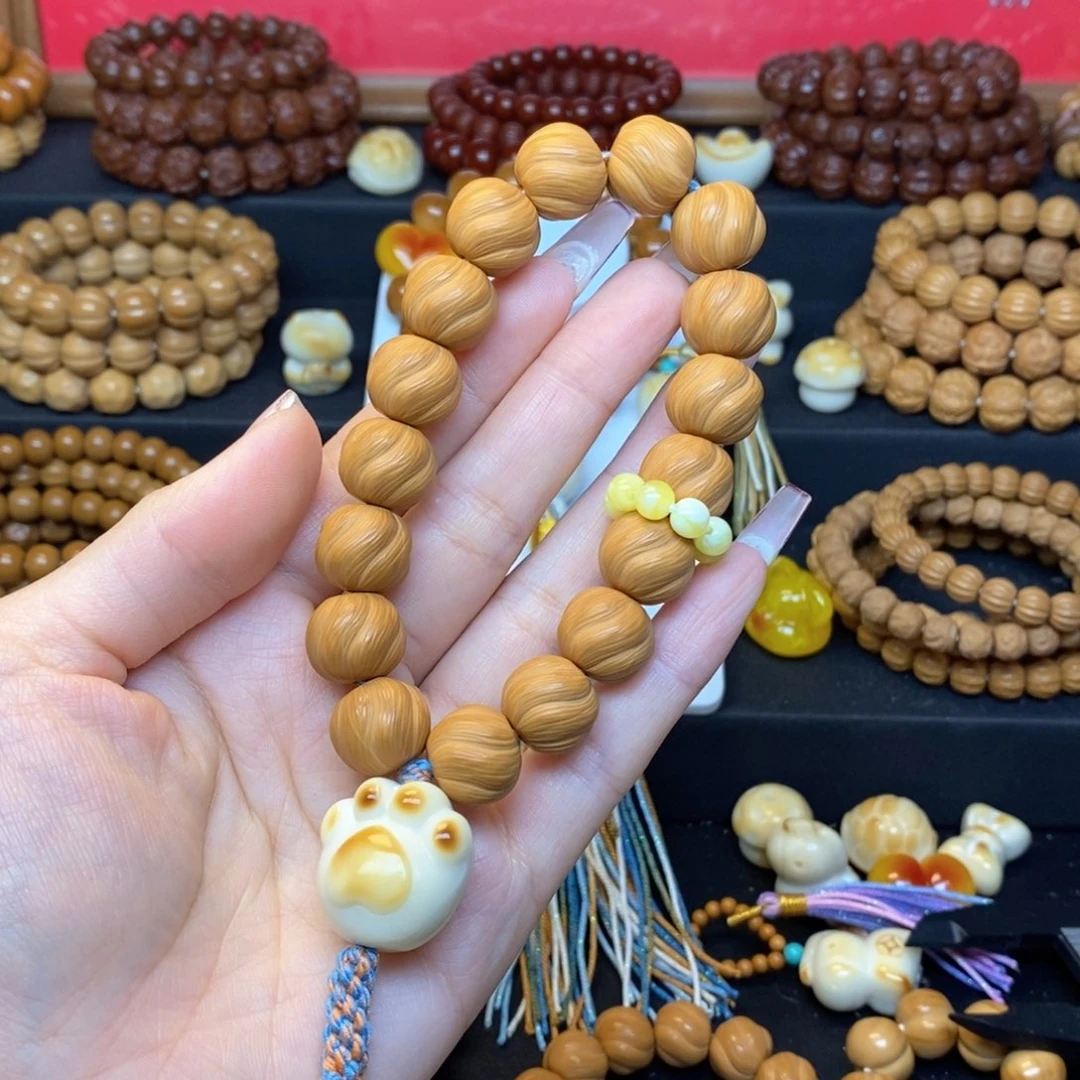 猴头核桃吊坠全品卷卷酥手持➕配饰