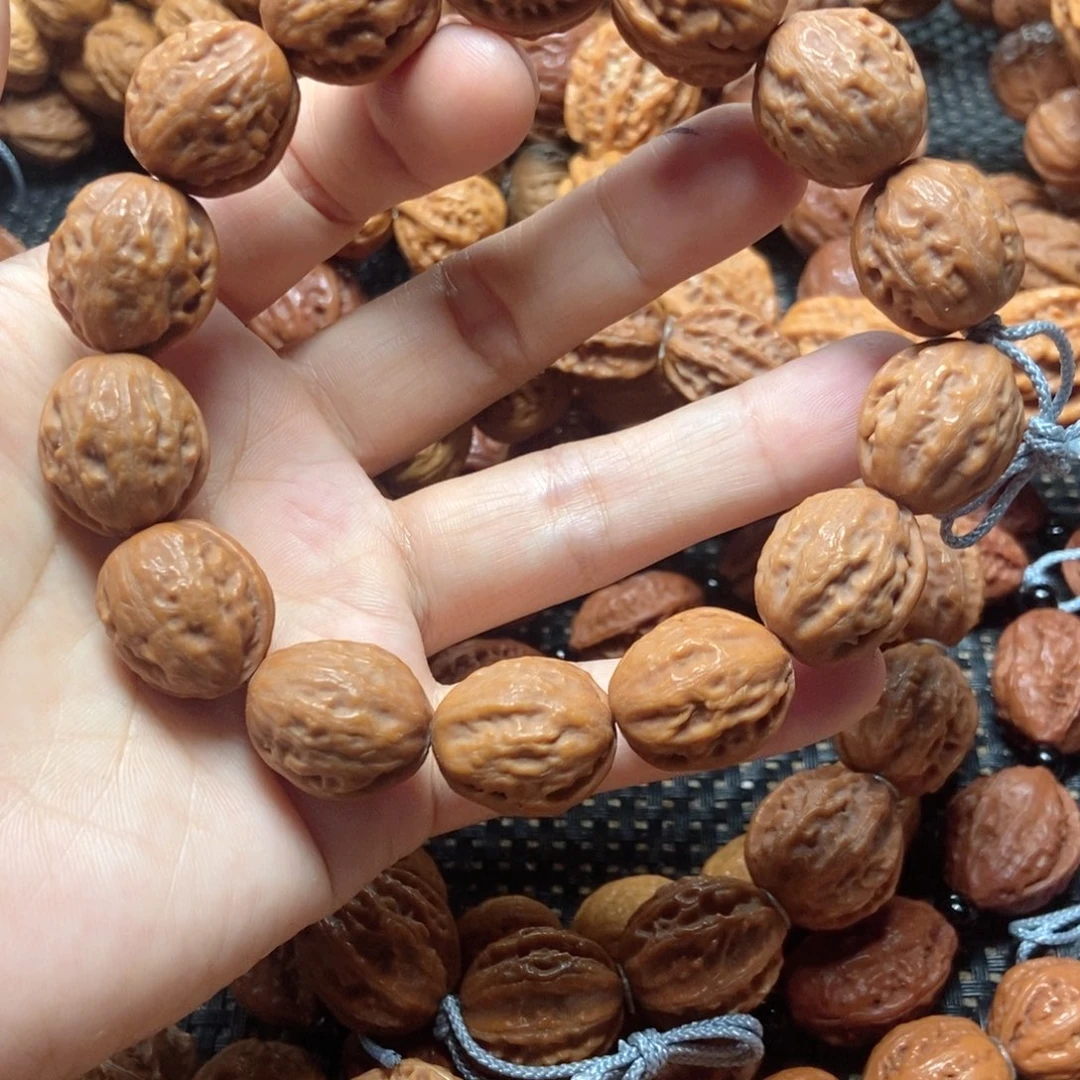 天***，桃核吊坠小金豆手串