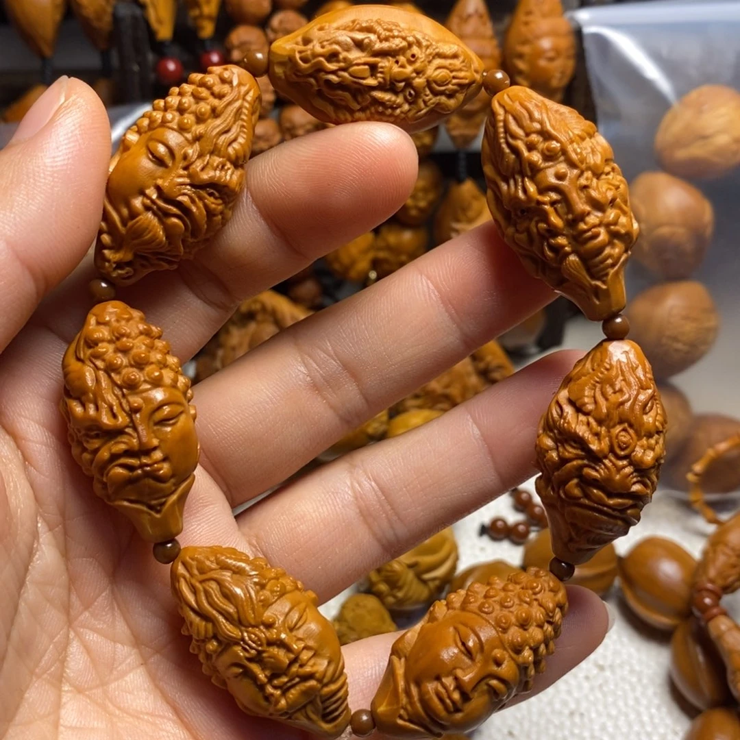 橄榄核吊坠一念之间