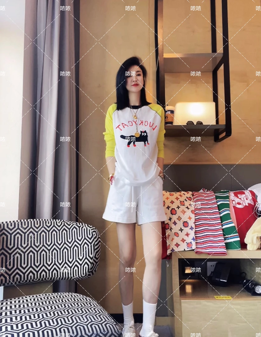 哝NONG-2025春夏新款欧若风猫咪印花拼接插肩袖长袖上衣0992487