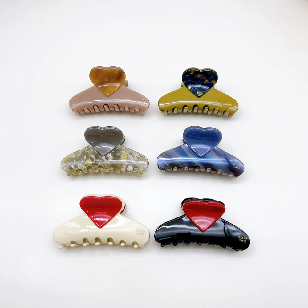 04889 好啊商店 醋酸爱心元宝抓夹一个，长9cm左右