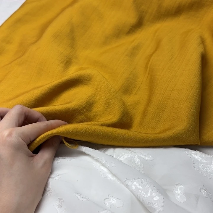 混纺棉姜黄色2米。