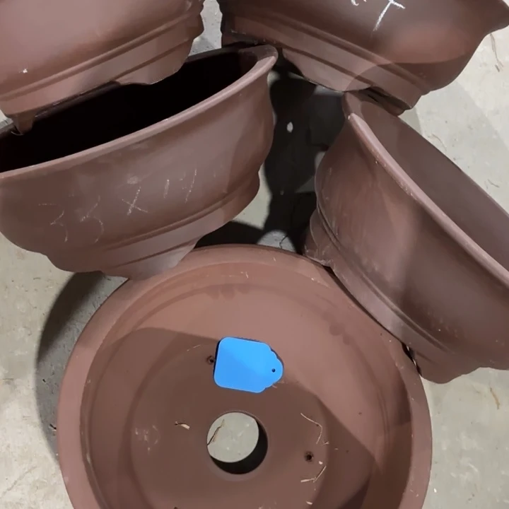 紫砂花盆100/5。  33-14。