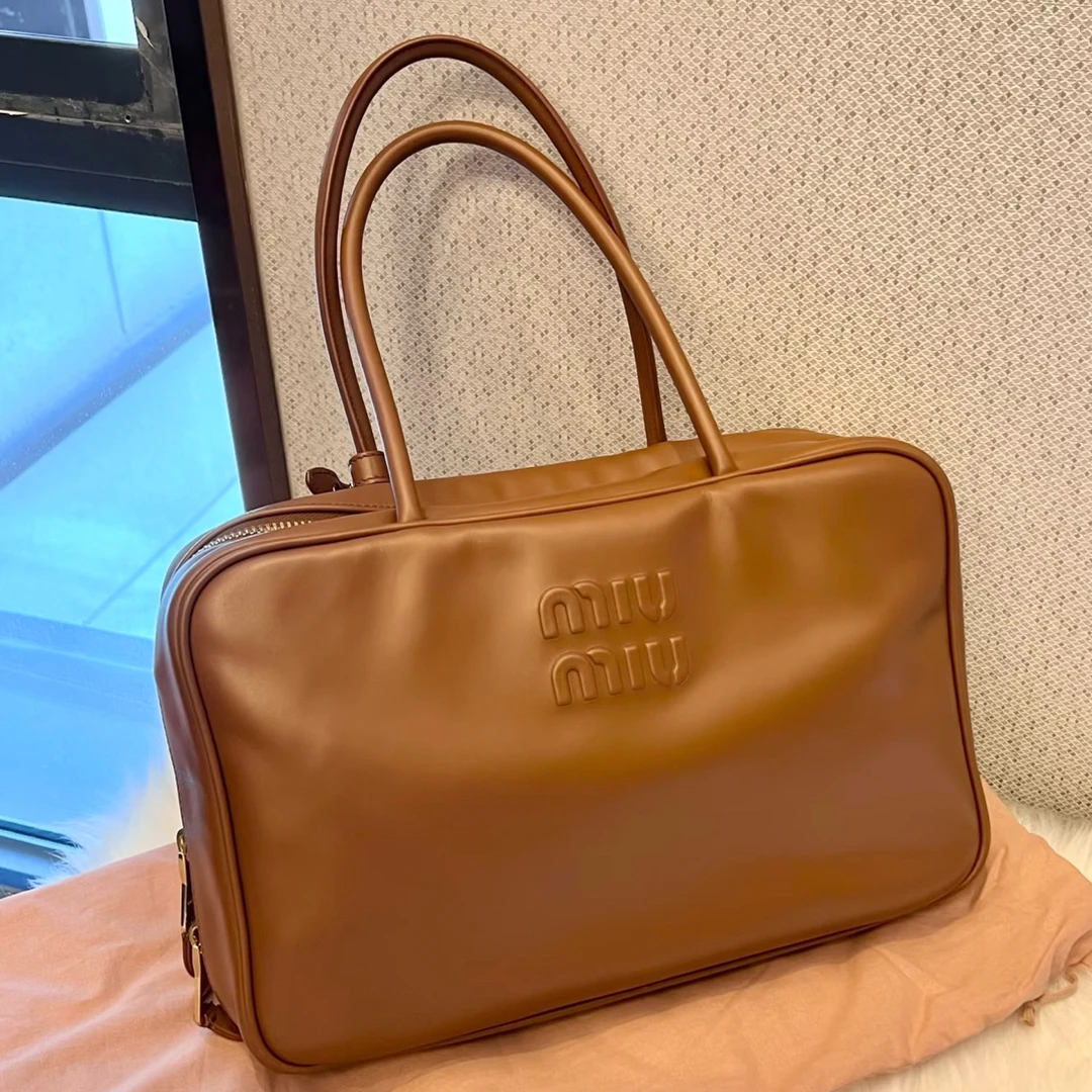95新 MIU MIU/缪缪 95新焦糖色保龄球/手提时尚箱包
