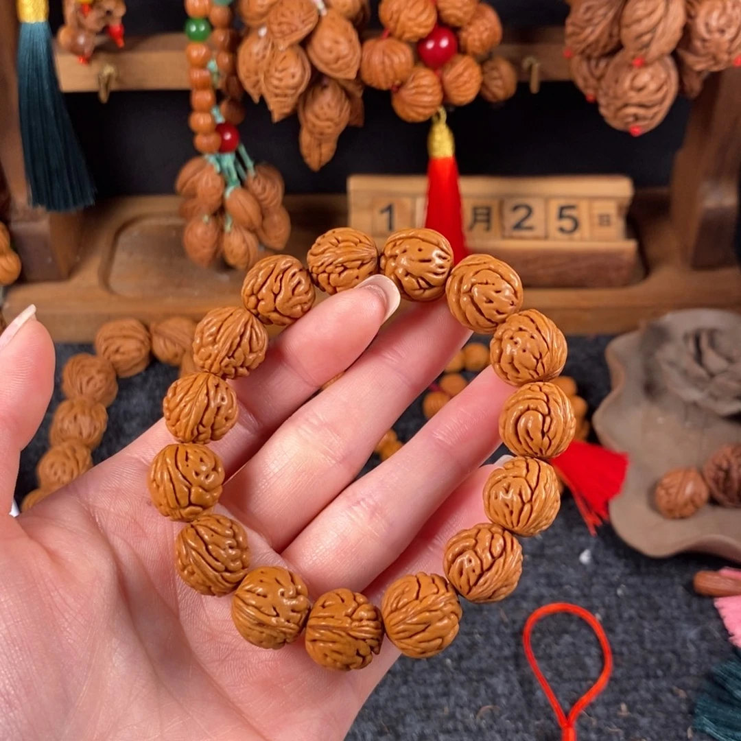 吊坠桃核桃枭手串