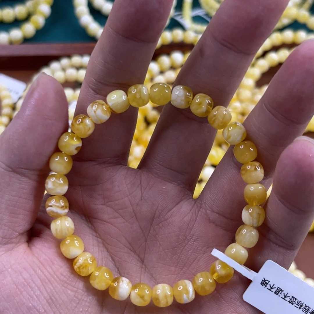 蜜蜡未镶嵌珠宝奇石7mm橘底金白溶洞
