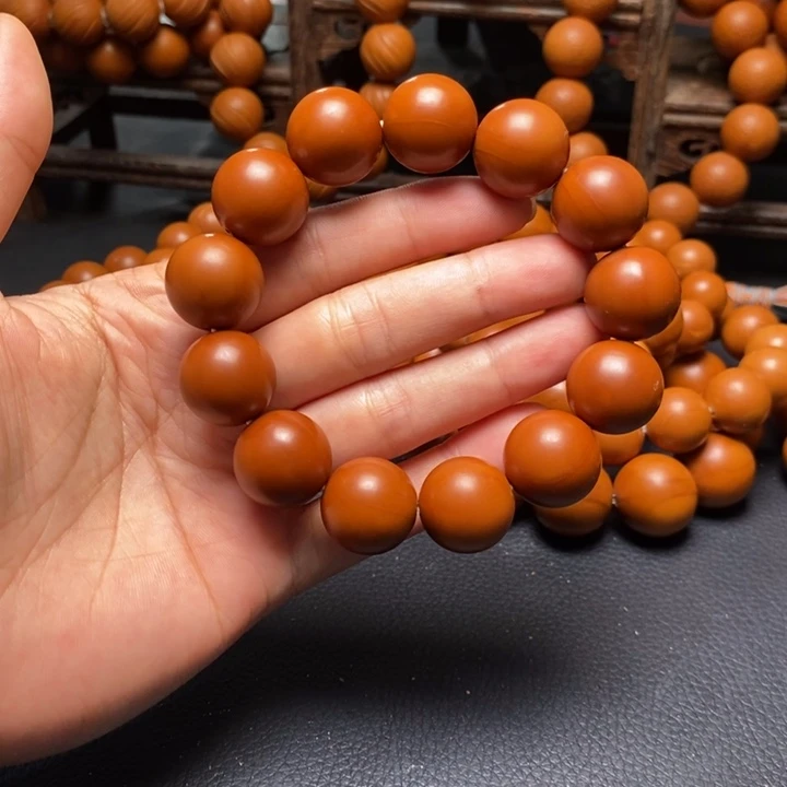 手串橄榄核1.7尺寸红料光珠