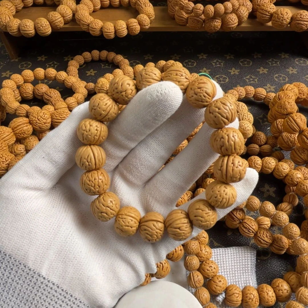 桃核手串木*吟肉纹元宝