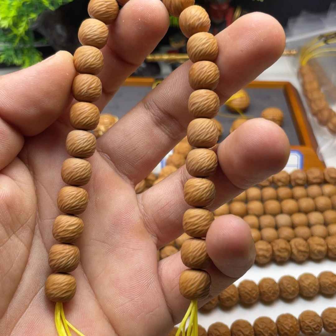 乾***宇猴头核桃手串云锦猴头