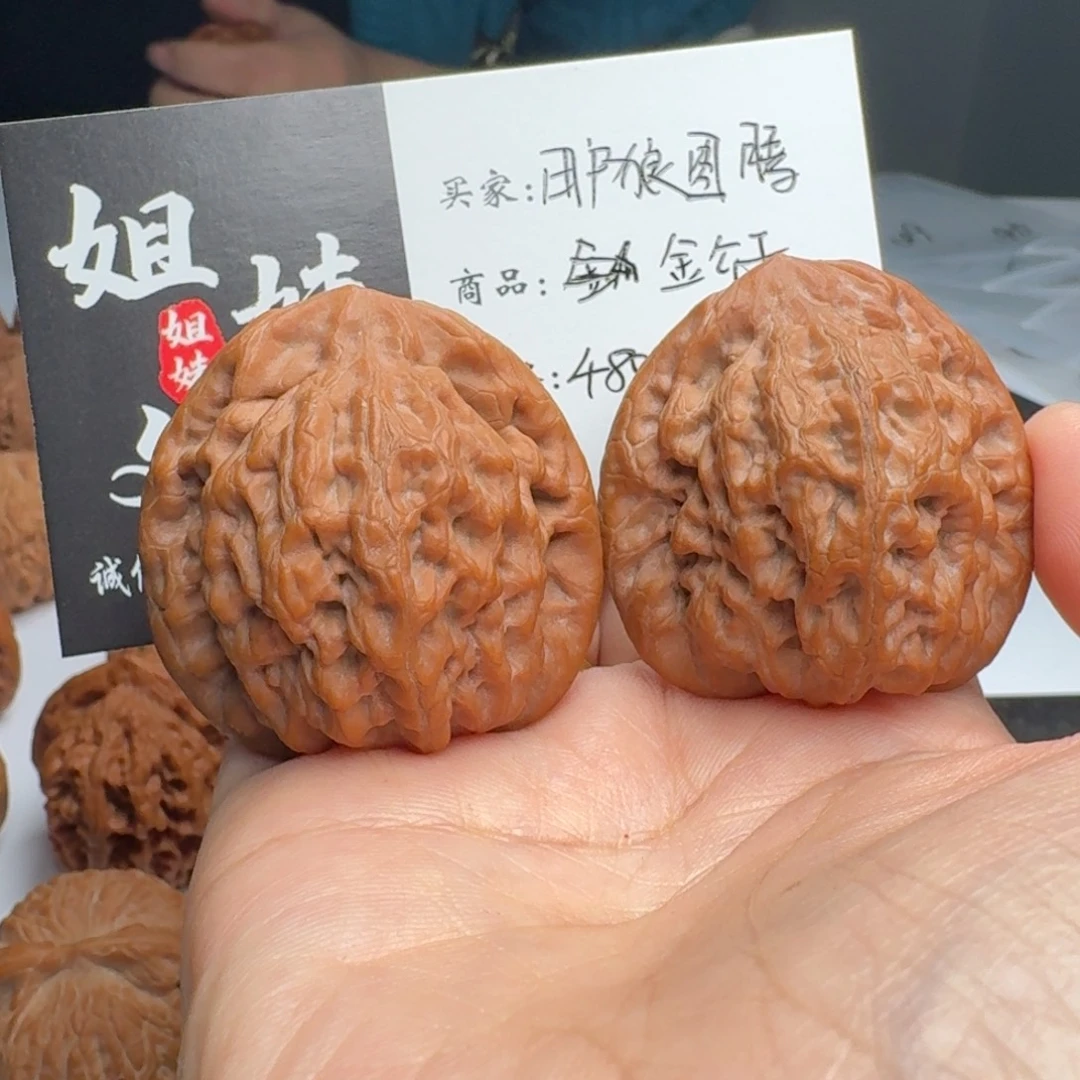 用***腾桃核吊坠金公子帽
