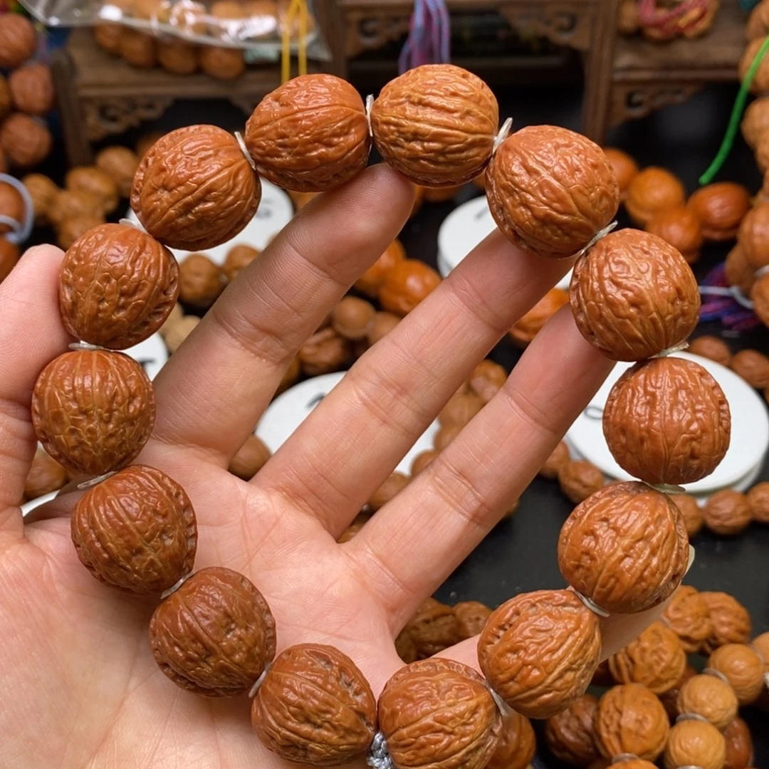 桃核手串小红钱袋