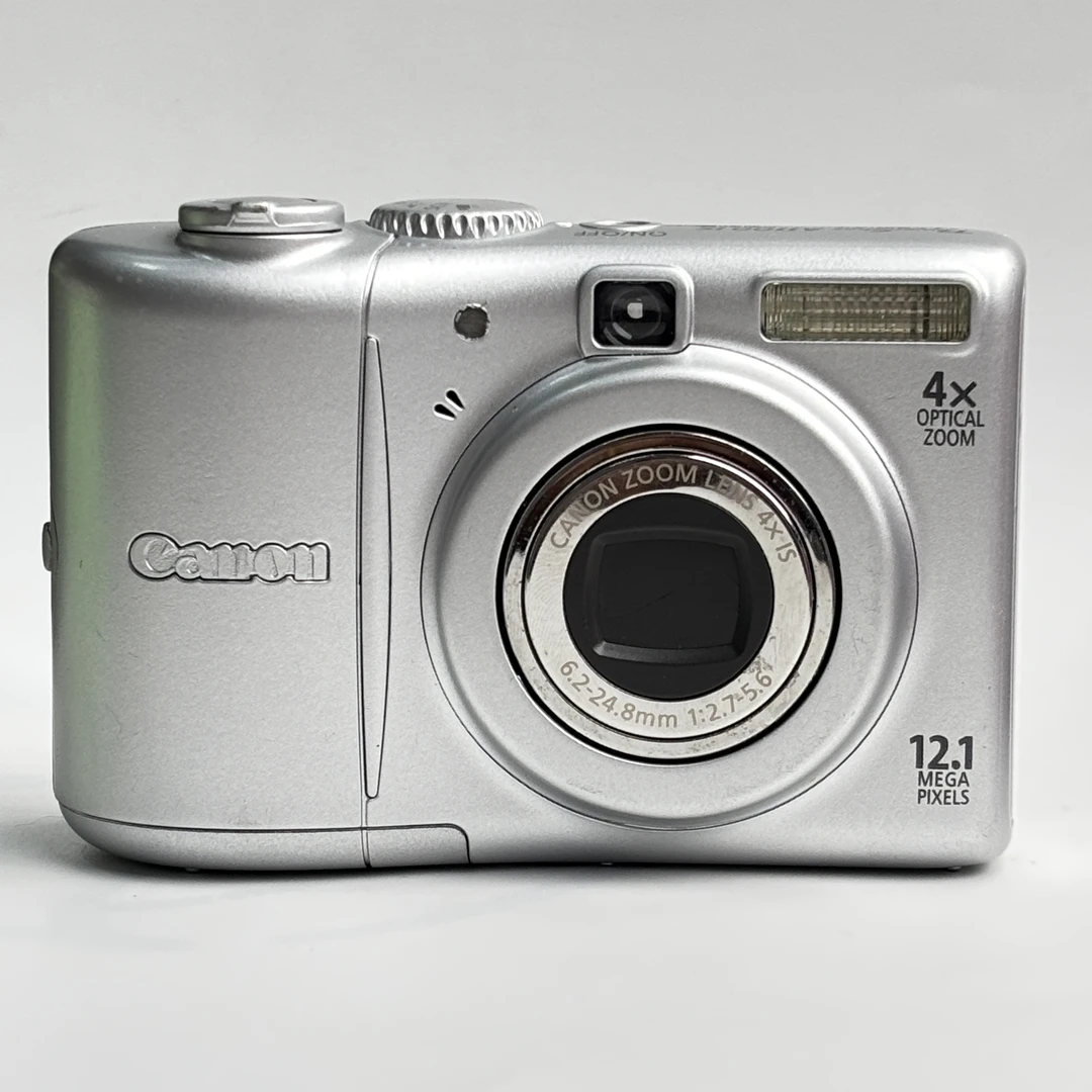 95新 Canon/佳能 a1100银色1210万像素4倍变焦复古ccd