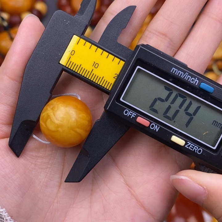 桐***业琥珀未镶嵌裸石蜜蜡M