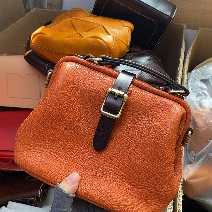 头层牛皮瑕疵单肩包