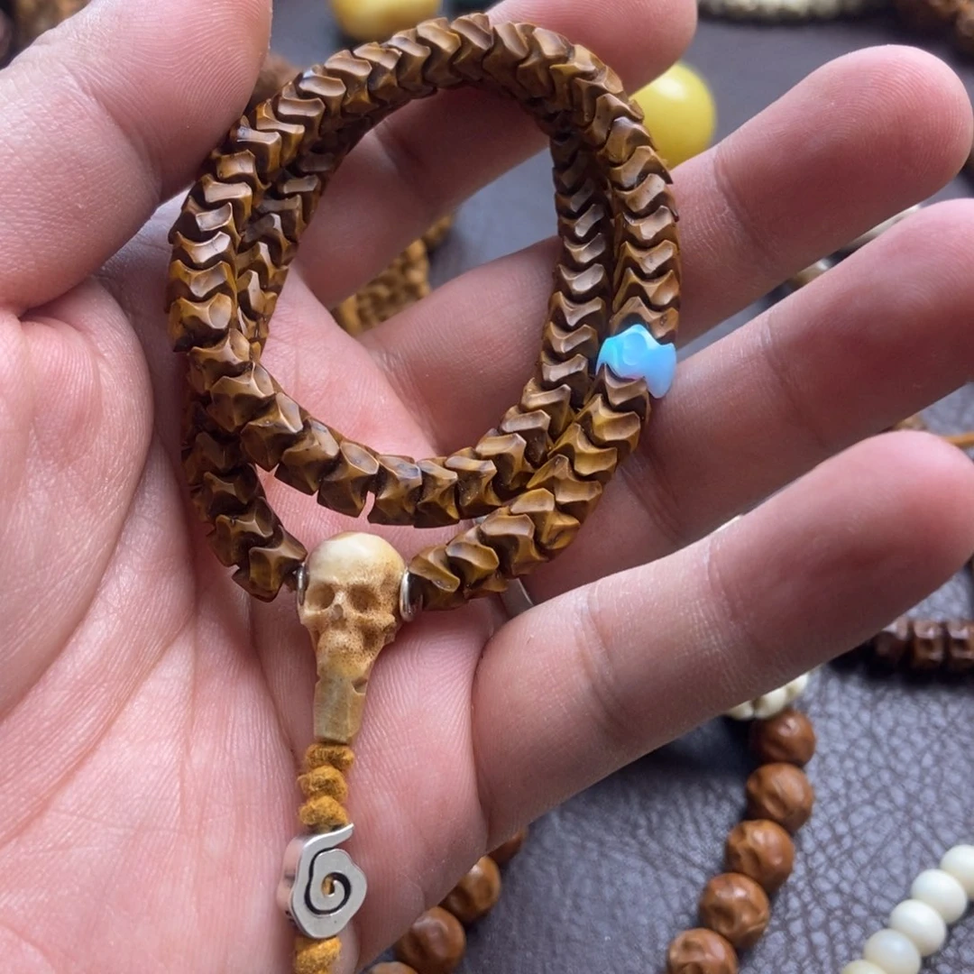 紫金鼠吊坠问***。紫金鼠大长鞭