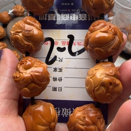 居****橄榄核手串橄榄雕工艺与