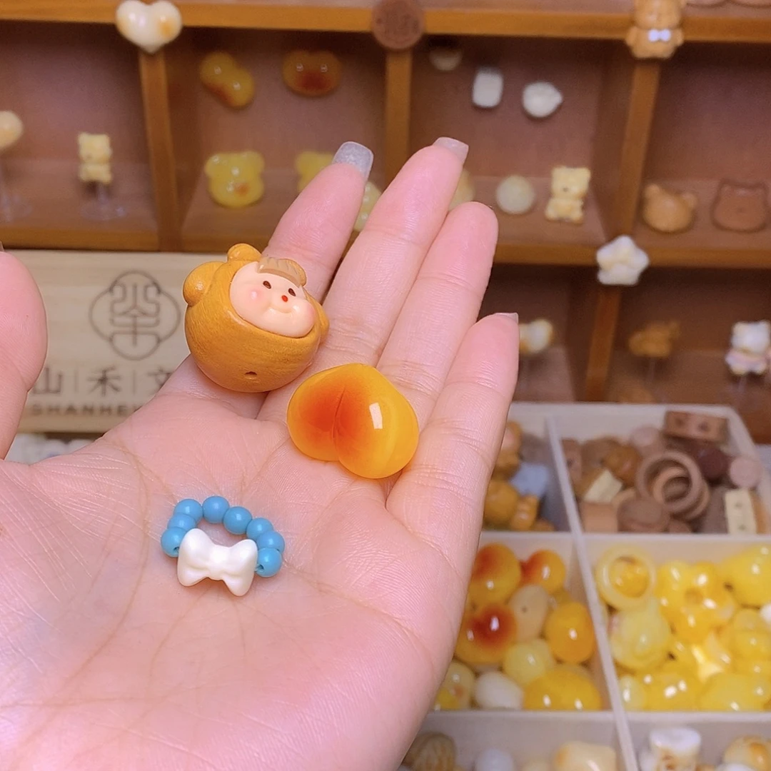 M***M猴头核桃吊坠爱心绿卡多妹