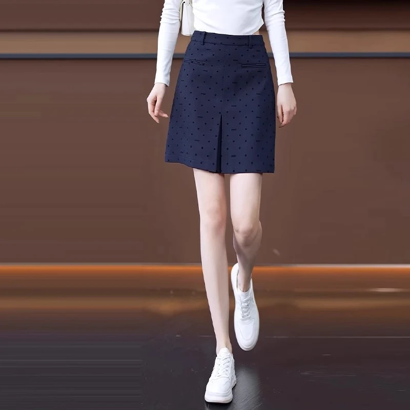 藏蓝色新款波点半身裙女2025年春夏新款时尚开叉设计感气质A字裙
