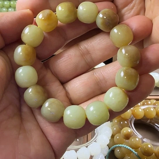 笑***着和田玉（糖玉）未镶嵌手链