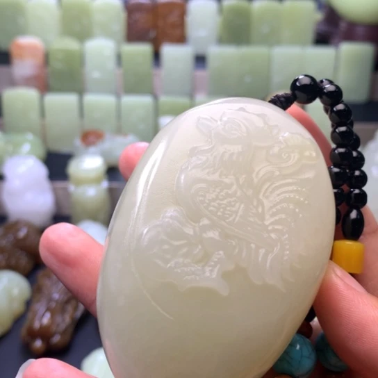 石材方解石玉手把件