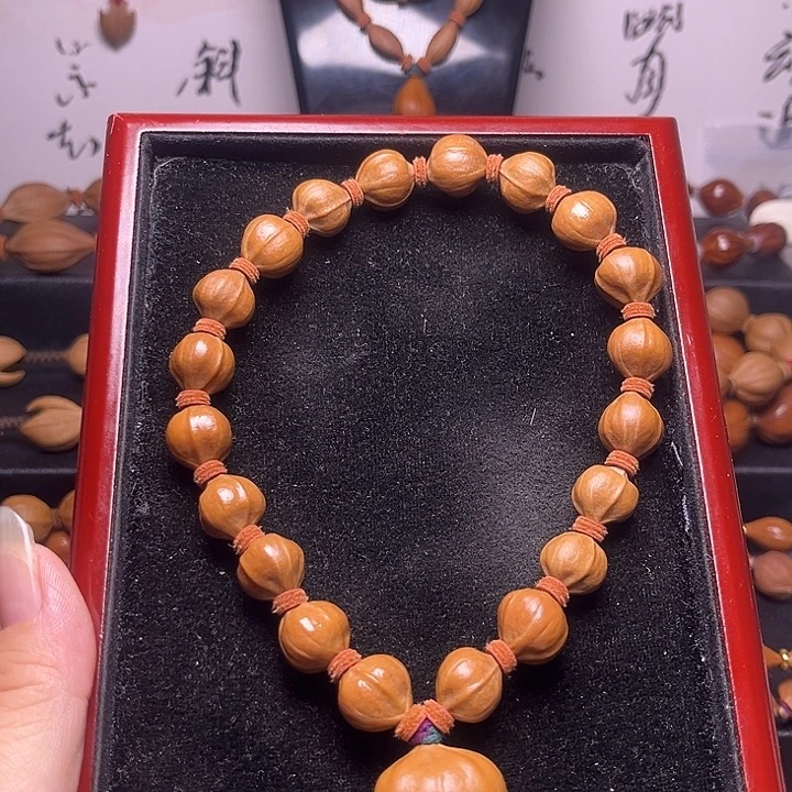 橄榄核手串蜜桃臀手持13.13