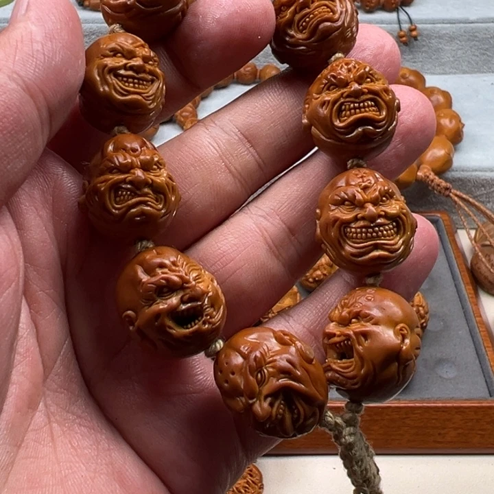 小***尹手串橄榄核橄榄核雕工艺制作