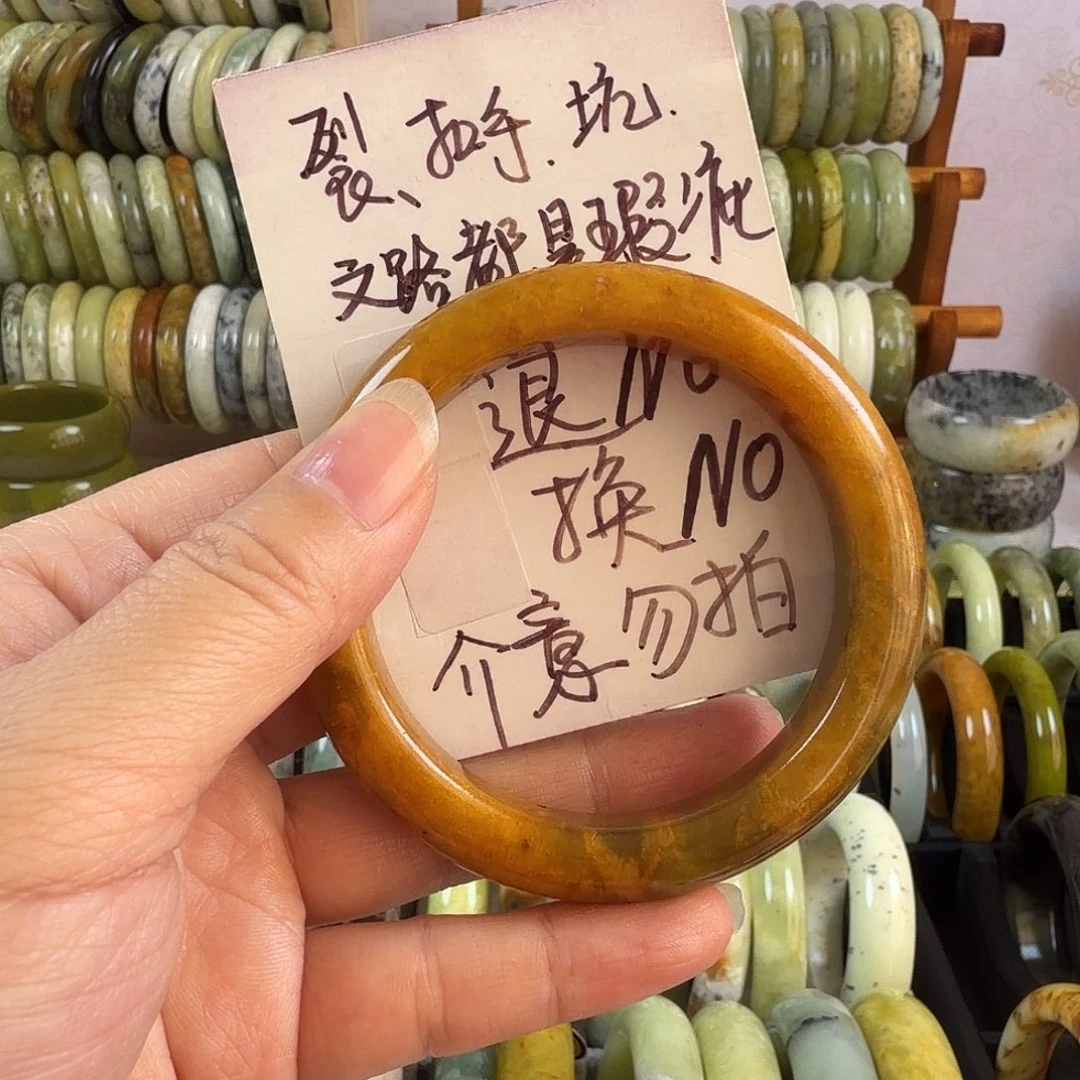 春***和蛇纹石玉未镶嵌手镯