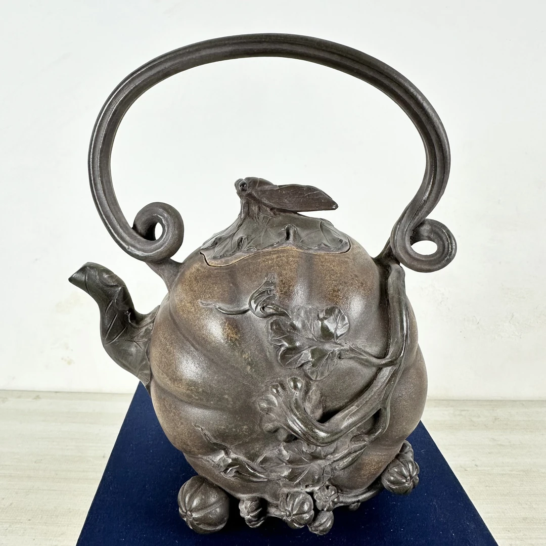 回知了南瓜提梁紫砂壶460c长16厘米直径8厘米高19厘米段泥9孔出水