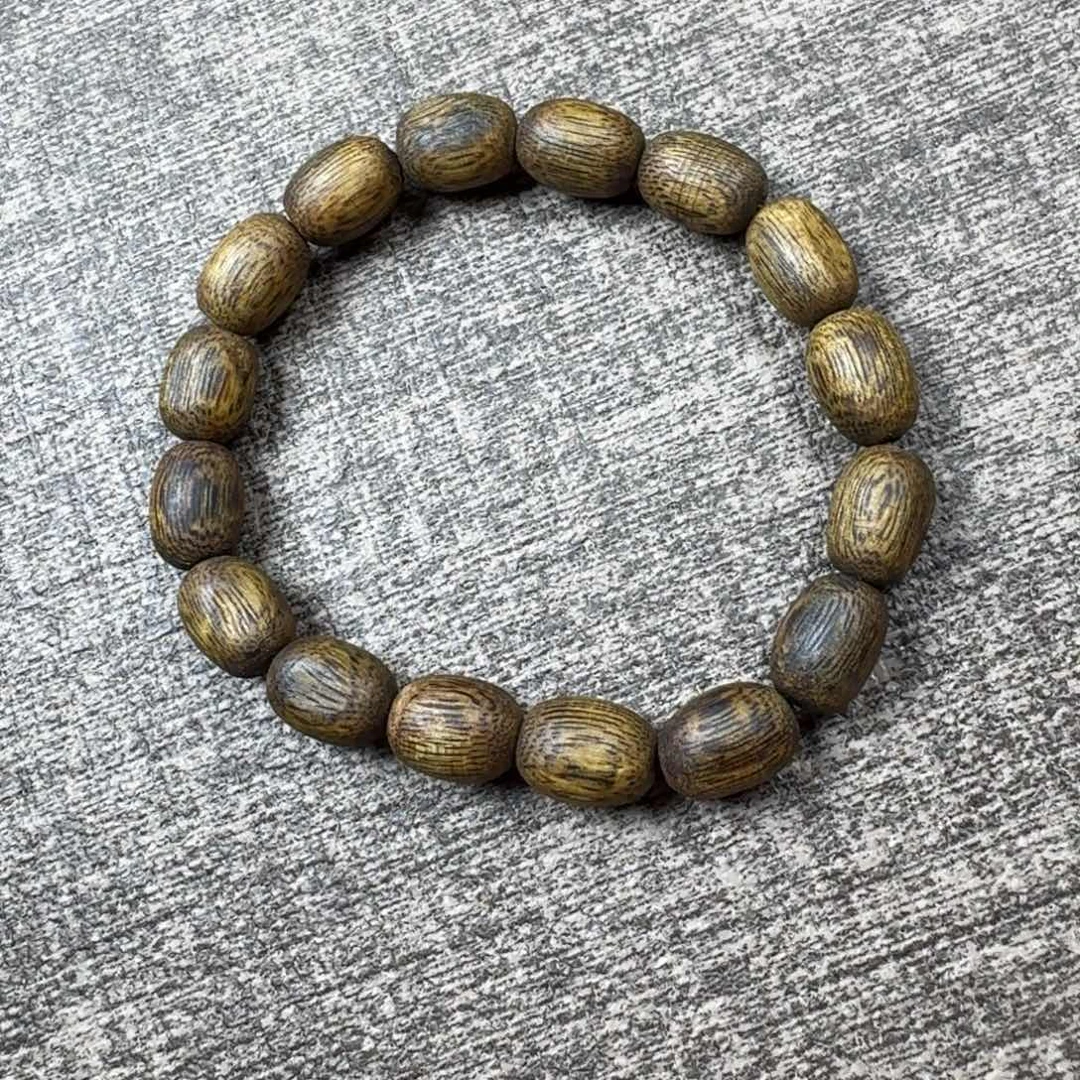 沉香碎屑沉香H**U绿棋树心枣珠0.9/7