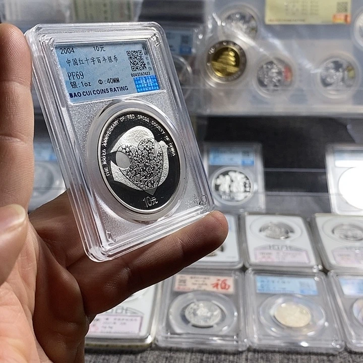 纯银无盒证特价04年红十字百年银币一枚如图