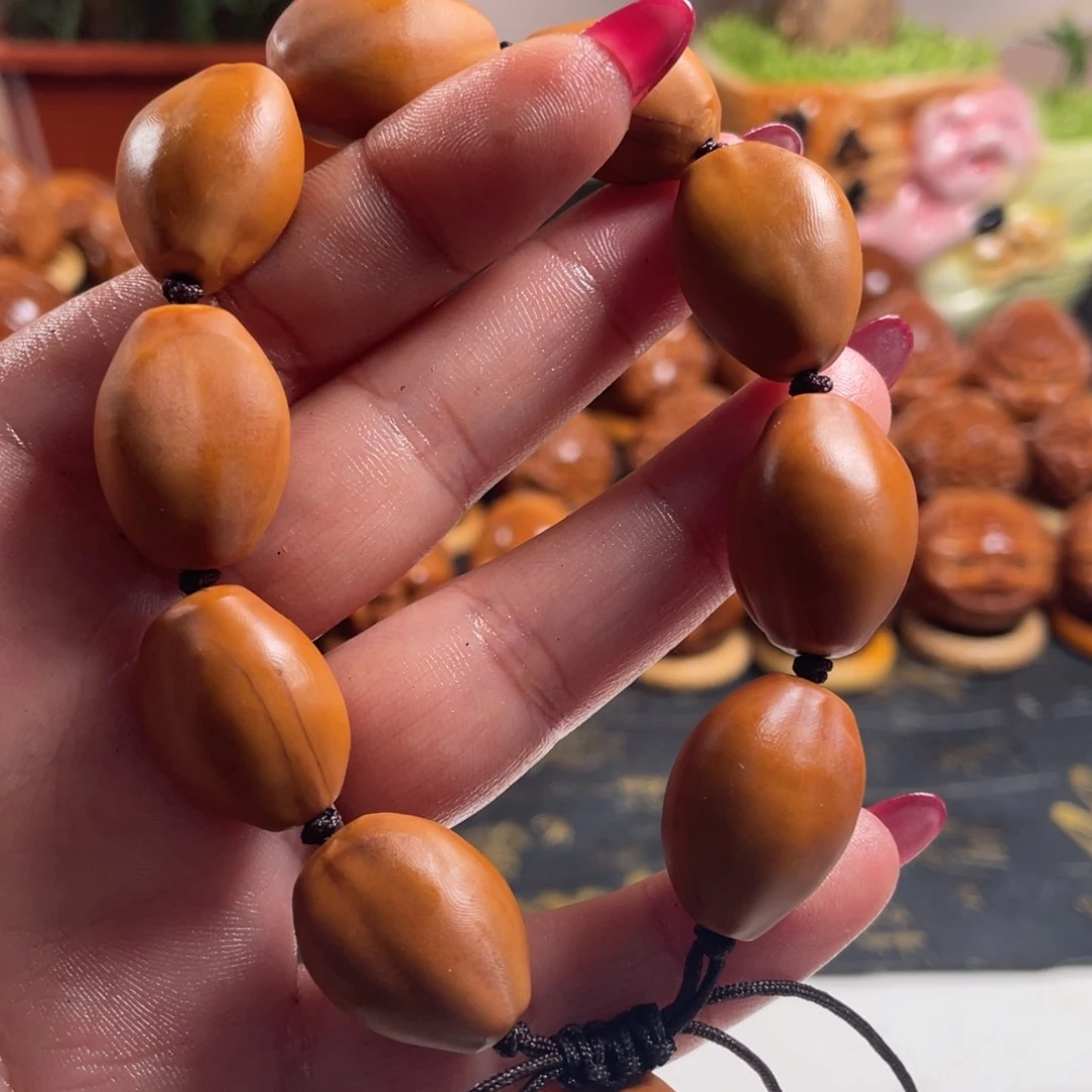 橄榄核吊坠十阴手串